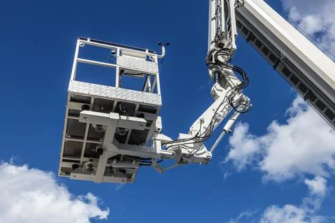 The automatic retractable boom of the construction machine, of the fire truck Stock Photos