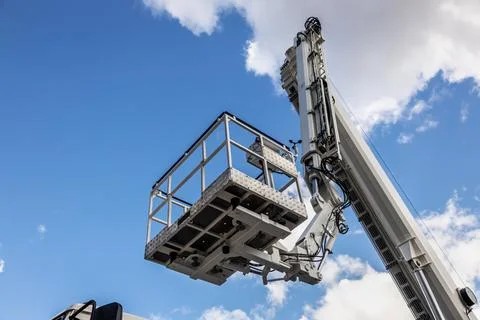 The automatic retractable boom of the construction machine Stock Photos