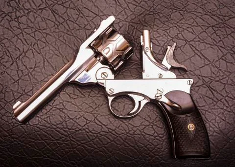 Automatic Revolver repeating handgun Stock Photos