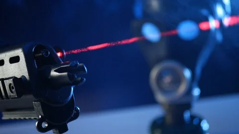 Automatic rifle on dark background with optical sight gas mask on dark Stock Footage 119169280