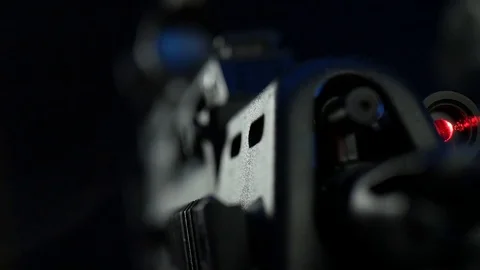 Automatic rifle on dark background with optical sight gas mask on dark Stock Footage 119169407