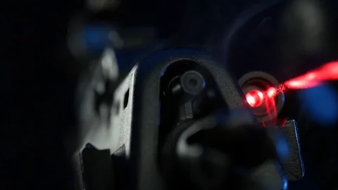 Automatic rifle on dark background with optical sight gas mask on dark Stock Footage 119169462