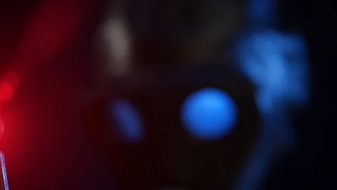 Automatic rifle on dark background with optical sight gas mask on dark Stock Footage 119169475