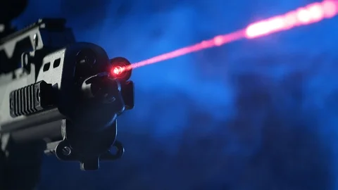 Automatic rifle on a dark background with a telescopic sight Stock Footage 117970021