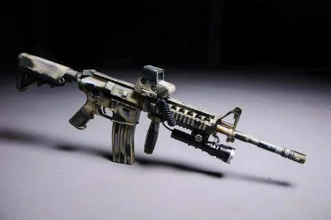 Automatic rifle M16 with LED flashlight Stock-Fotos