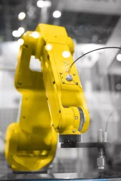 Automatic robot arm working in industrial environment Stock-Fotos