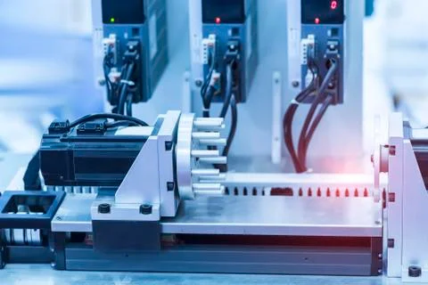 Automatic robot in a smart factory. Assembly line Stock Photos
