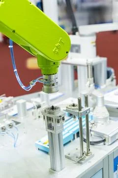 Automatic robot in a smart factory. Assembly line Stock Photos