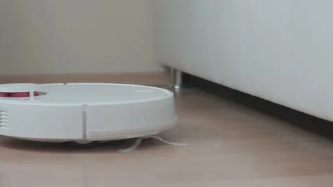 Automatic robot vacuum cleaner can not go under the furniture Stock Footage 146597201