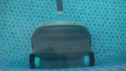 Automatic Robotic Pool Cleaner Vacuuming an Above Ground Video stock 343894784