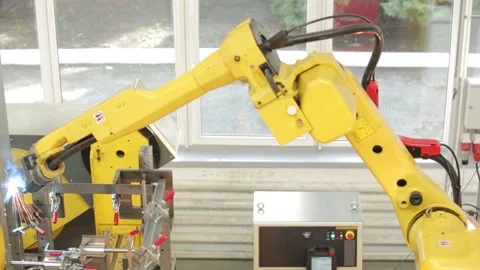 Automatic robotic welding using robots Stock Footage 158760518