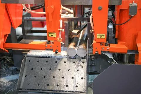 Automatic saw with high efficiency, cutting shaft and coolant, the machine .. Stock Photos