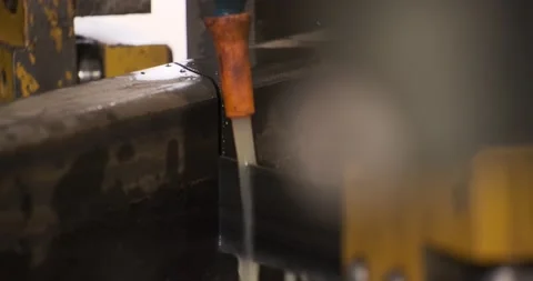 Automatic sawing machine cutting tool raw metal part on industrial band saw Video stock 170161492