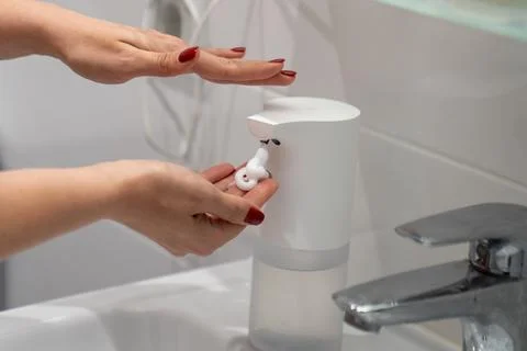 Automatic sensor touchless soap dispenser Fotos Stock