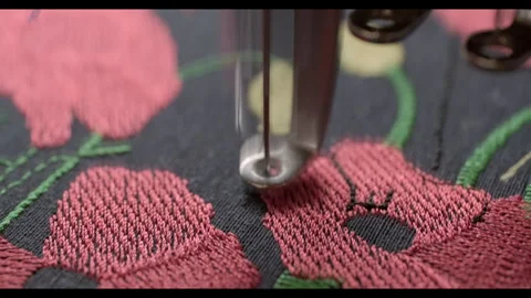 Automatic sewing machine embroiders generic floral design Stock Footage 270425908