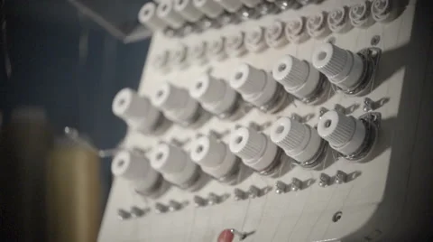 Automatic sewing machine embroiders on white cloth in slow motion Stock Footage 60131928