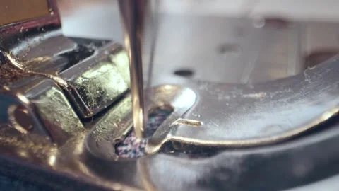 Automatic sewing machine needle in work process. Close-up of sewing machine Stock Footage 269813311