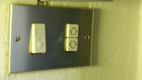 Automatic shade, Finger press down arrow on the switch 動画素材 92842423