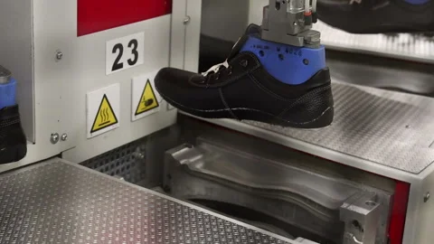 Automatic Shoe making machine close up preparation for gluing the sole timel Stock Footage 125895978
