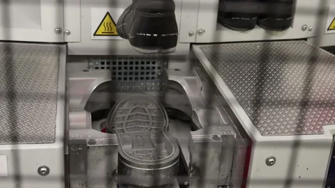 Automatic Shoe making machine sole gluing Video stock 125897018