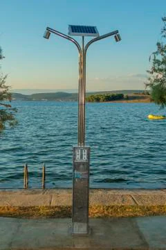 Automatic shower on beach with solar charging Stock Photos