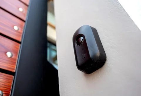 Automatic sliding front gate at modern villa Stock Photos