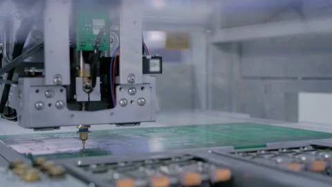 Automatic SMD pick and place machine assembling computer printed circuit board Stock Footage 136485633