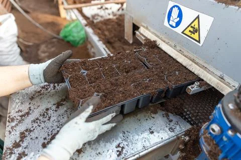 Automatic soil distributor Stock Photos