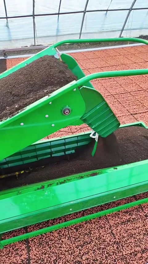 Automatic soiling equipment for nursery Stock Footage 270253107