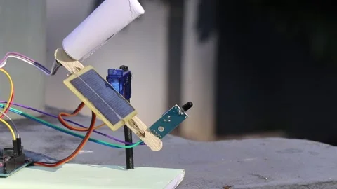 Automatic solar tracking solar panels working model built at home Stock Footage 321893190