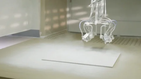 Automatic spray painting machine, spreading white paint on the flat sheet of Stock Footage 118143165