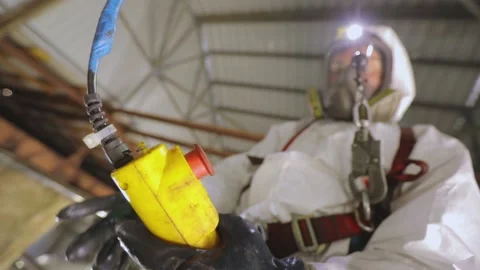 Automatic steam cleaning of the tanker. Worker in chemical protection. A worker Stock Footage 169444038