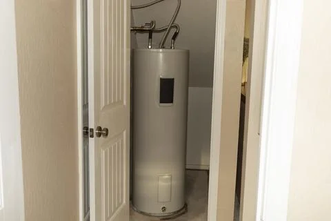 Automatic Storage Water Heater 75 Gal In Storeroom. Modern Electric Boiler Stock Photos
