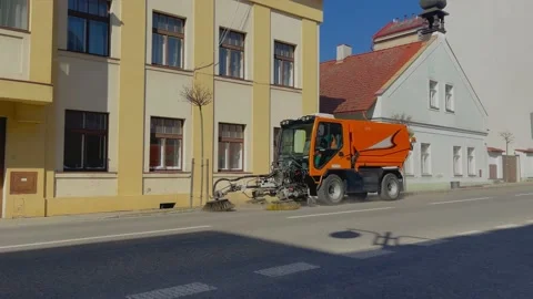 Automatic street sweeper machine, modern technology cleaning sidewalk. Orange Stock Footage 201989722