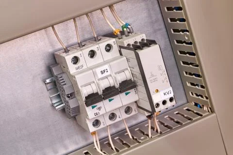 Automatic switch and phase control relay in the electrical Cabinet. Stock Photos