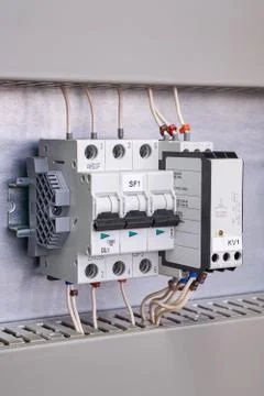 Automatic switch and phase control relay in the electrical Cabinet. Stock Photos