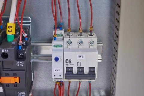 Automatic switch, phase control relay and contactor in the electrical Cabinet Foto stock