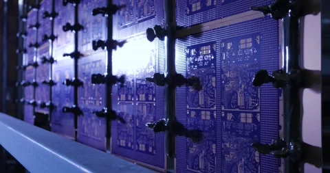 Automatic testing of electronic circuit boards with special liquid, in a modern Stock Footage 200927321