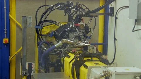 Automatic testing engine of car on an automobile plant Stock Footage 77627695