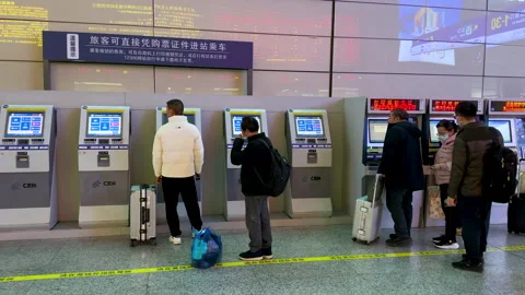 Automatic ticketing machines at departure hall of Hongqiao Railway Station Stock Footage 297738258