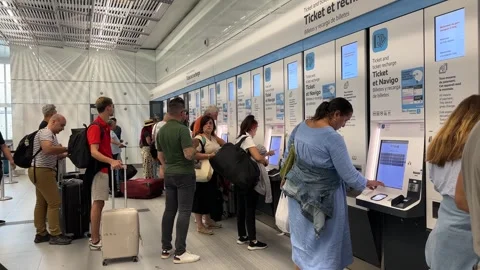 Automatic Tickets Recharge at Paris Orly Airport Metro Subway France passengers Stock Footage 281344567
