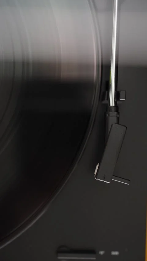 Automatic tonearm in vinyl record player starting to play Stock Footage 302420023