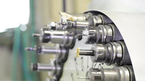 Automatic tool changer rotating bits with tools at CNC lathe milling center Vídeo Stock 48996554