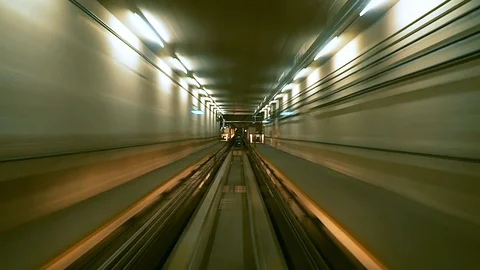 Automatic Train Moves in a Tunnel Fast Speed Modern City Time Lapse Stock Footage 122802437