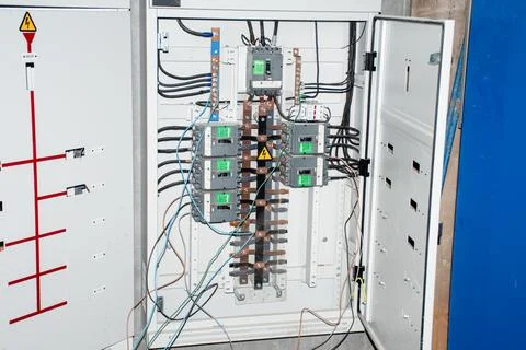 Automatic Transfer Switch installed under the building water to switch to a.. Stock Photos