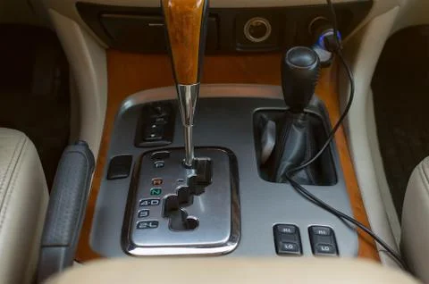 Automatic transmission control console and car interior are close up Stock Photos