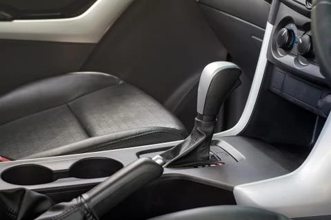 Automatic transmission gear shift. Car interior. Stock Photos