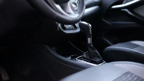Automatic transmission in a modern car. Gearshift lever, Climate control and Stock Footage 203978717
