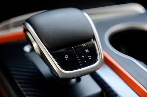 Automatic transmission selector in the interior of a modern car. Stock Photos
