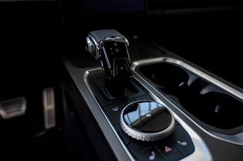 Automatic transmission selector in the interior of a modern car. Stock Photos